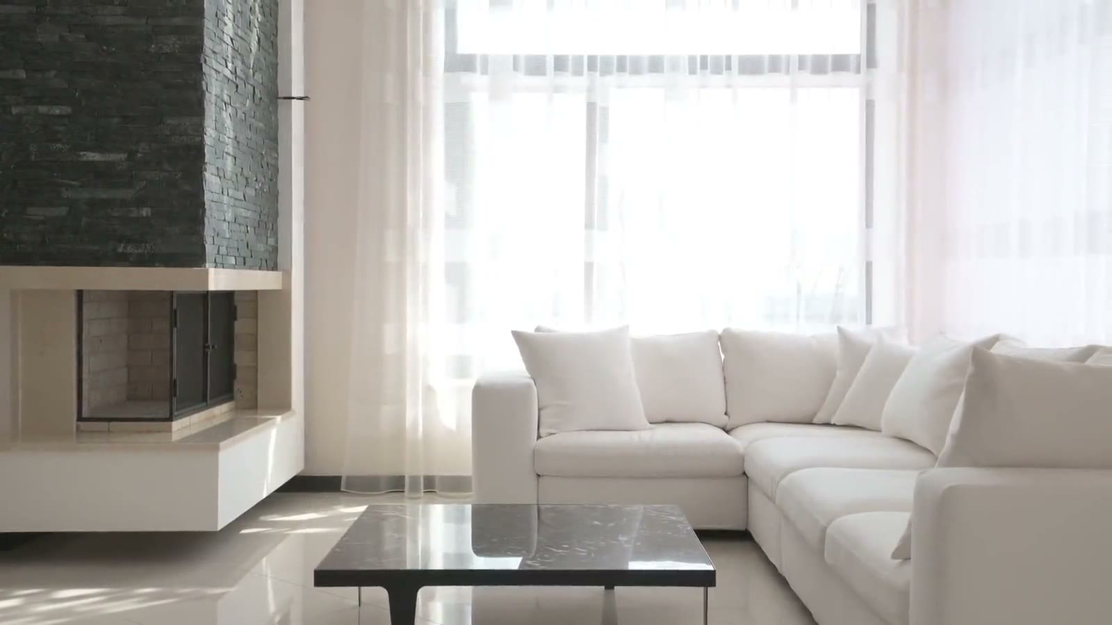 Bright living room with daylight through a large window
